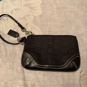 Coach, black, small wristlet, in good to fair condition